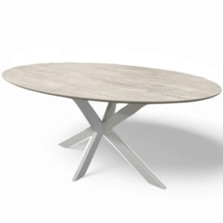 Bergamo eettafel - spiderpoot, travertin HPL - sfeerfoto in interieur